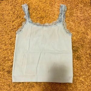 I am selling a baby blue lace tank top. Size medium